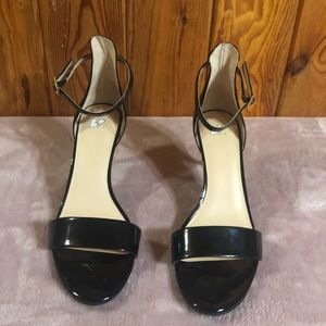 Black heels with gold strap